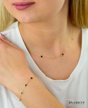 Bransoletka pozłacana  Czarne koniczynki  925 DIA-BRA-5953-925 Pozłacana bransoletka wykonana z najwyższej próby srebra z subtelnymi koniczynkami. Idealny pomysł na prezent dla każdej kobi (3).JPG