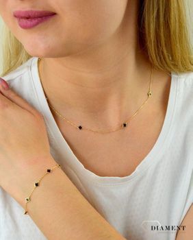 Bransoletka pozłacana  Czarne koniczynki  925 DIA-BRA-5953-925 Pozłacana bransoletka wykonana z najwyższej próby srebra z subtelnymi koniczynkami. Idealny pomysł na prezent dla każdej kobi.JPG