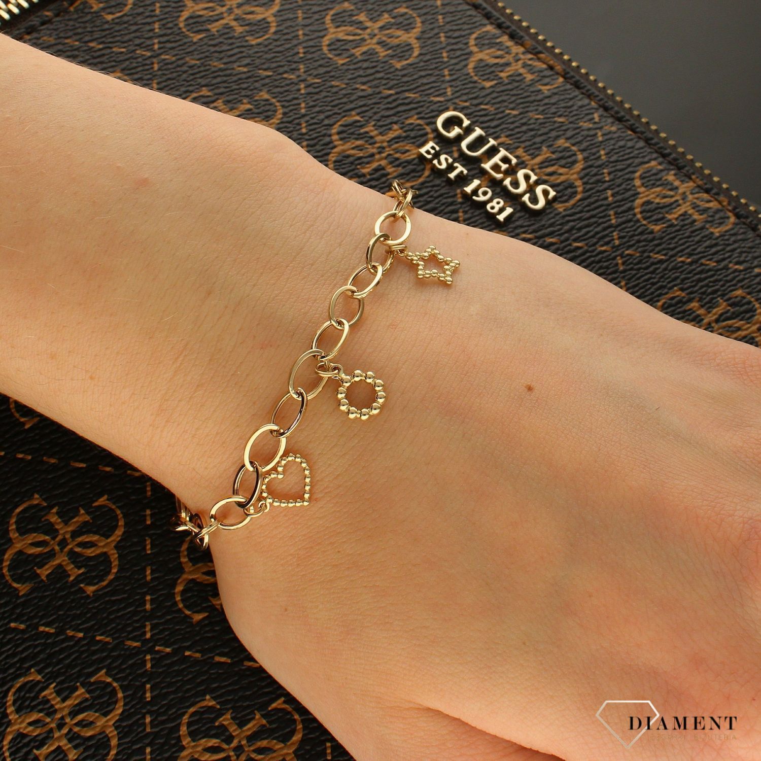 Złota bransoletka z wiszącymi elementami DIA-BRA-6202-585. Złota bransoletka z zawieszkami. Złota bransoletka damska. Złota bransoletka z kółeczek. Złota bransoletka z ozdobnymi elementami (2).jpg