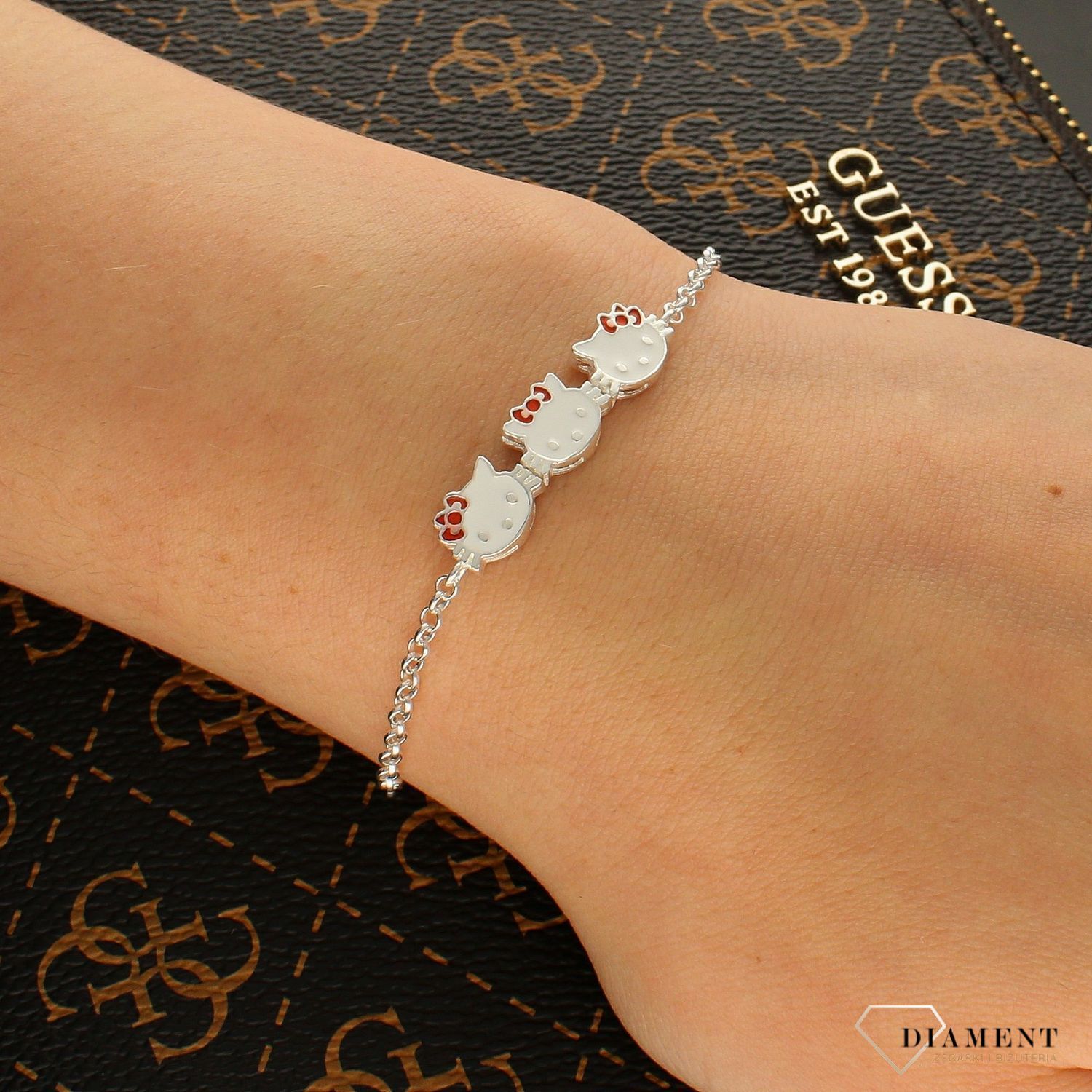 Srebrna bransoletka z kotkami 'Hello Kitty' DIA-BRA-6271-925.  Bransoletka na łańcuszku. Bransoletka srebrna z kotkami. Bransoletka z motywem bajkowym. Bransoletka Hello Kitty. Bransoletka dla dziewczynki.  (1).jpg