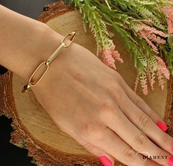 Złota bransoletka 585 splot spinaczowy duży DIA-BRA-7586-585. Prezentowana złota bransoletka to doskonała propozycja dla kobiet, które cenią sobie uniwersalne i oryginalne dodatki. Bransoletka w takiej formie to ciekawy model (1).jpg