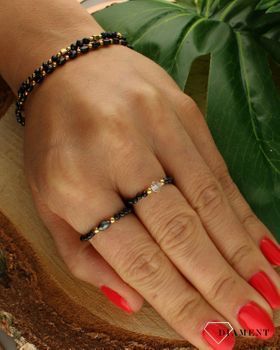 Bransoletka damska ze spinelem i turmalinem DIA-BRA-8011-925. Urocza bransoletka składająca się z drobnych kamieni naturalnych. Zastosowane kamienie w kolorze czarnym i złotym oprócz pięknego wyglądu posiadają szereg właściw.jpg