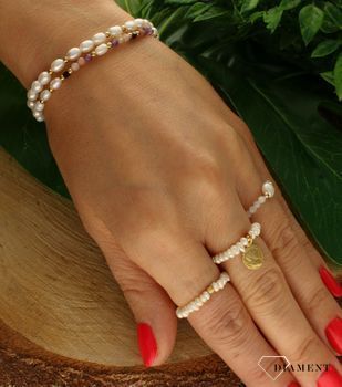 Bransoletka damska z perła,opalem,ametystem i kwarcem DIA-BRA-8029-925. Urocza bransoletka składająca się z drobnych kamieni naturalnych. Zastosowane kamienie w kolorze białej perły oprócz pięknego wyglądu posiadają szereg w.jpg