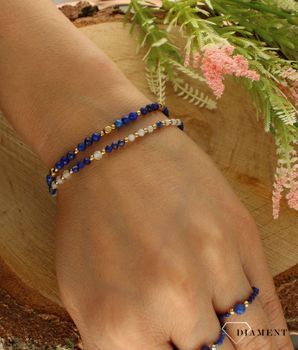 Bransoletka damska z lapisem DIA-BRA-8048-925. Urocza bransoletka składająca się z drobnych kamieni naturalnych. Zastosowane kamienie w odcieniach niebieskiego koloru oprócz pięknego wyglądu posiadają szereg właściwośc (2).jpg