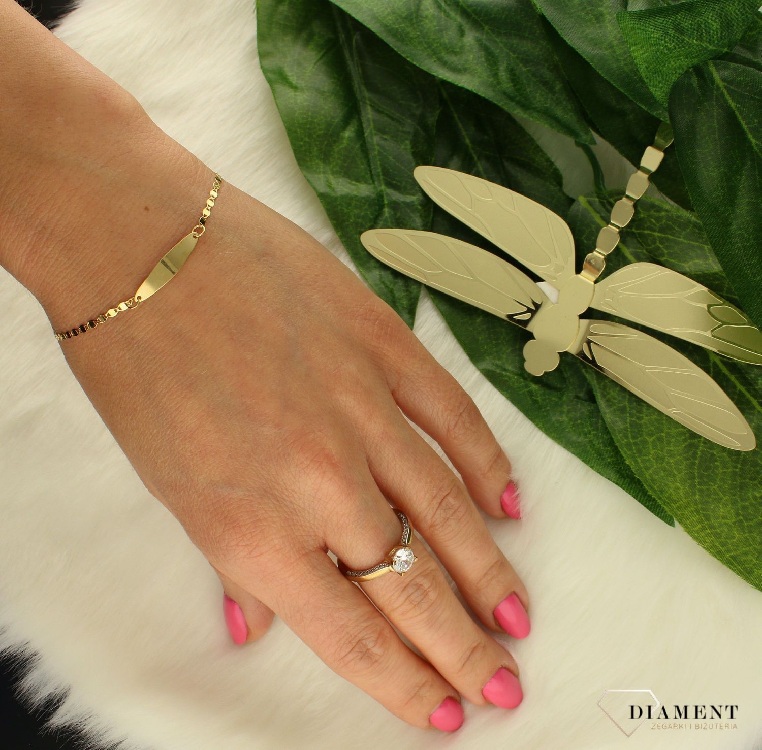 Złota bransoletka 585 delikatny biżuteryjny splot DIA-BRA-8096-585. Nowoczesny splot w połączeniu z wyjątkowym lśnieniem kruszcu sprawia, że złota bransoletka efektownie się prezentuje się w rozmaitych stylizacjac (2).jpg