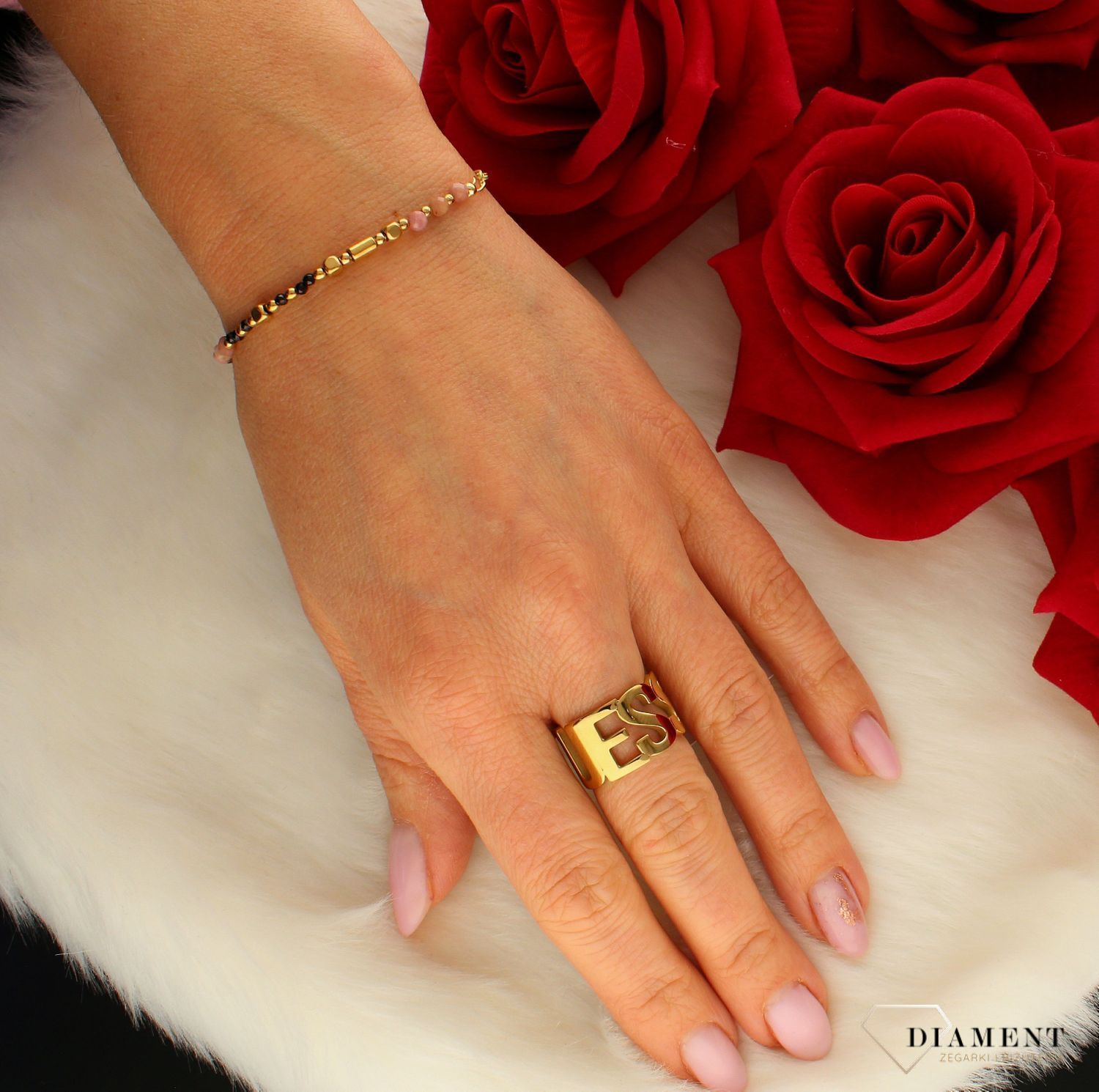 Bransoletka srebrna damska rodonit, spinel DIA-BRA-8131-925. Urocza bransoletka składająca się z drobnych kamieni naturalnych. Zastosowane kamienie w odcieniach czerni i różu oprócz pięknego wyglądu posiadają szereg właściwo.jpg