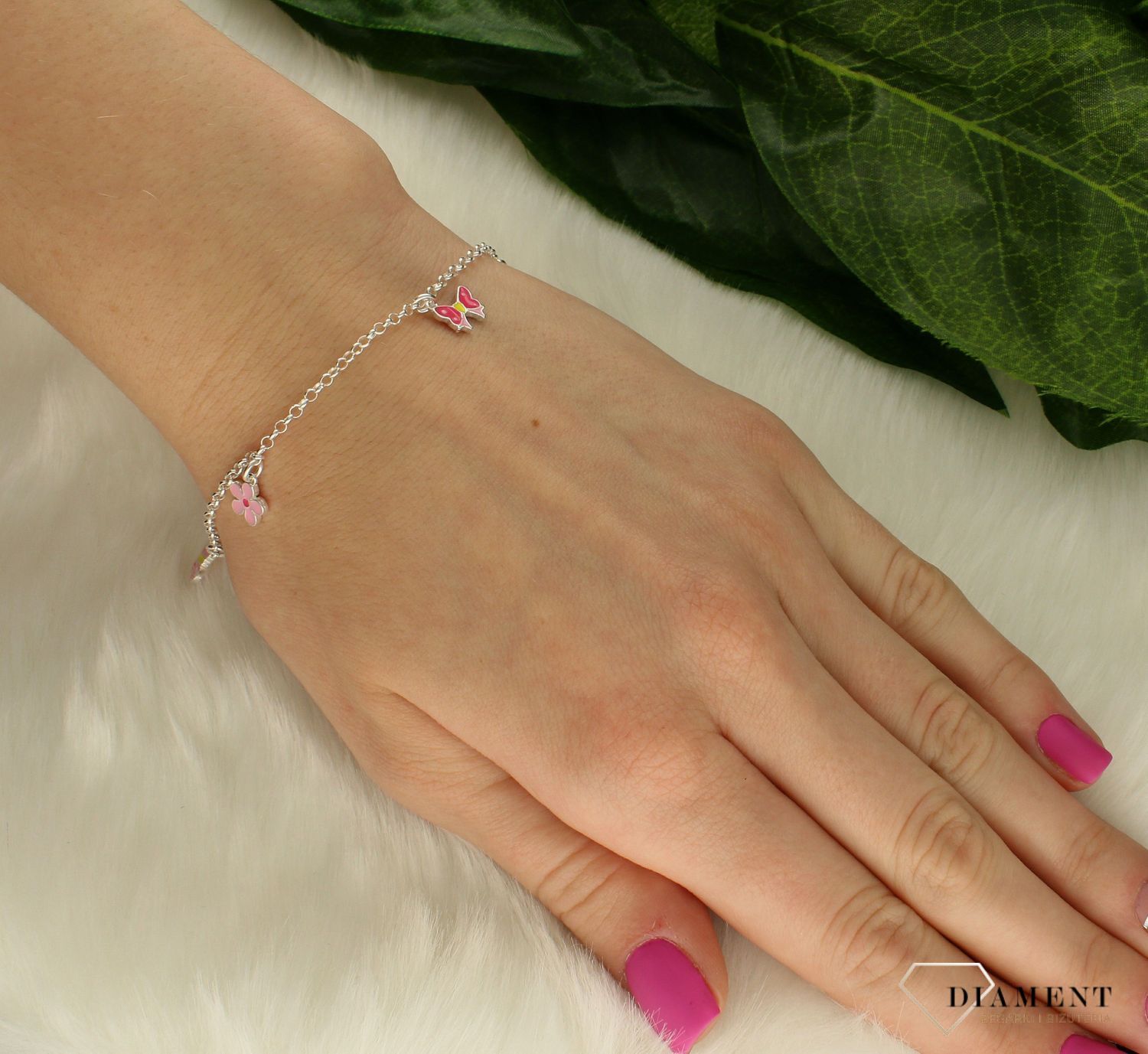 Srebrna bransoletka dla dziewczynki różowe zawieszki DIA-BRA-83360-925.  Niesamowita bransoletka wykonana z najwyższej próby srebra z subtelnym elementem trzech różowych elementów motylek, kwiatek i kokardka. Idealny pomysł  (3).jpg