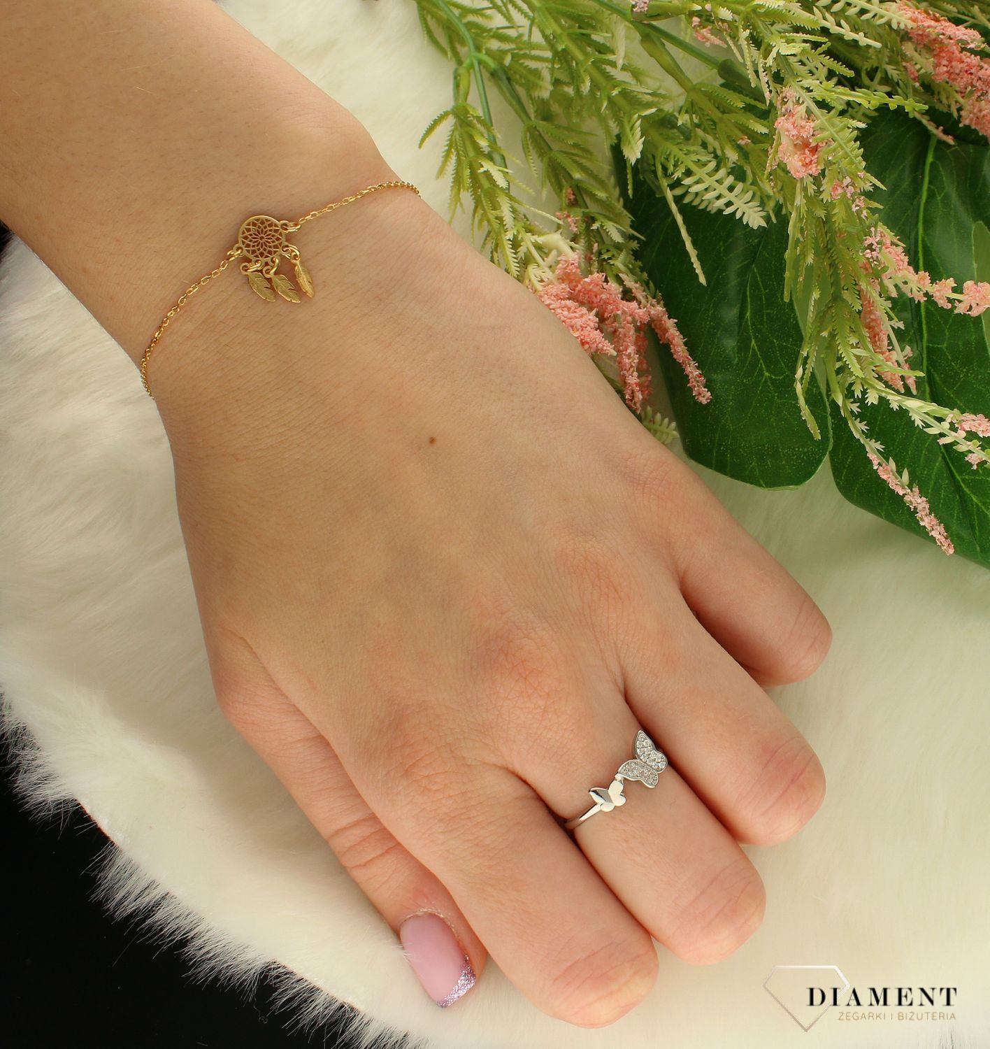 Bransoletka srebrna Łapacz snów pozłacana  DIA-BRA-8866-925.  Bransoletka Dall'Acqua wykonana ze srebra próby 925. Bransoletka z ażurowymi zawieszkami o wzorze łapacz snów. Bransoletka pozłacana idealna na prezent dla ukochanej (.jpg