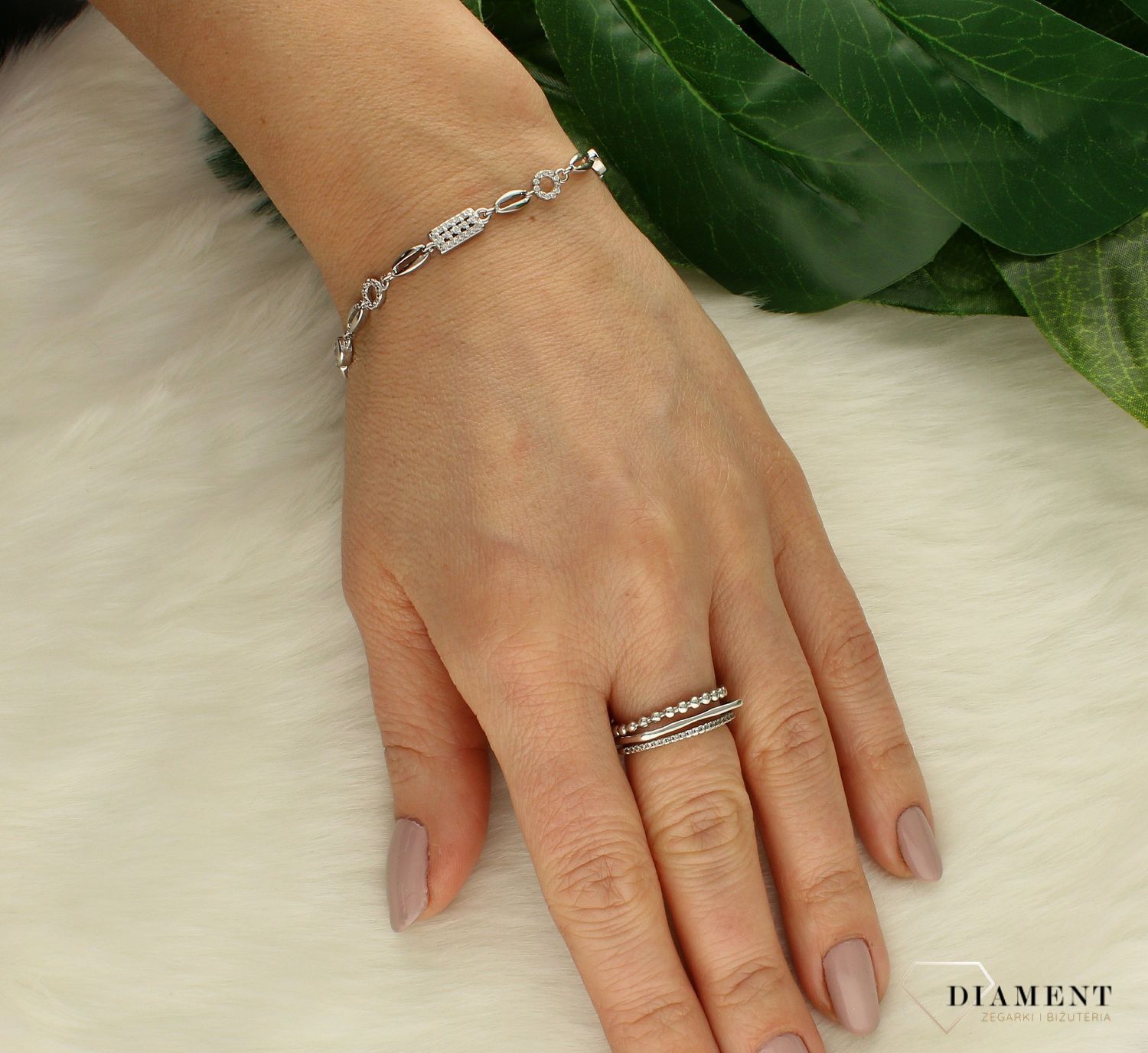 Srebrna bransoletka damska wysadzana białymi kamieniami Miłosne upięcie DIA-BRA-9653-925s.jpg