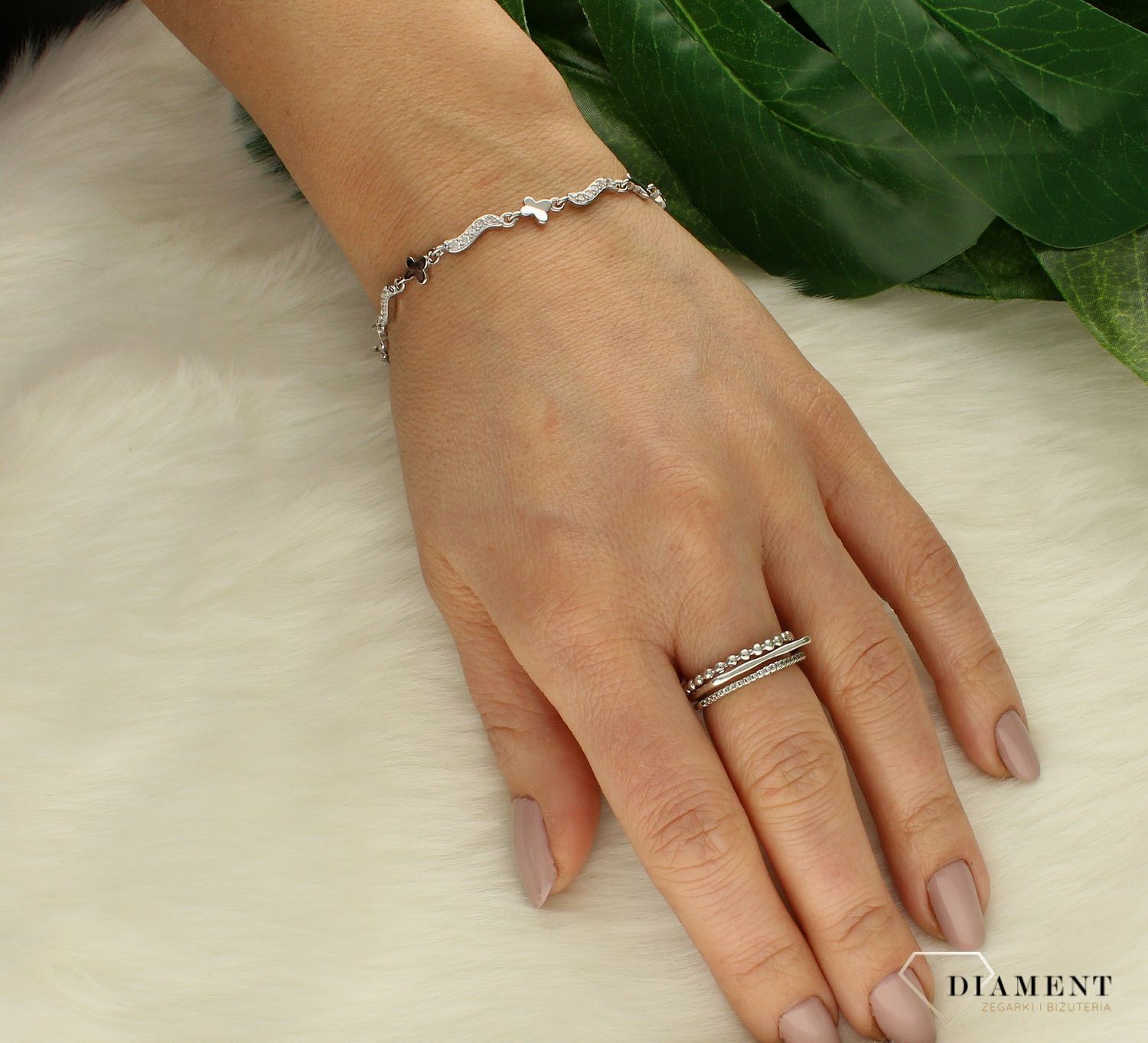 Srebrna bransoletka damska z motylkami i wygiętymi elementami DIA-BRA-9659-925cv.jpg