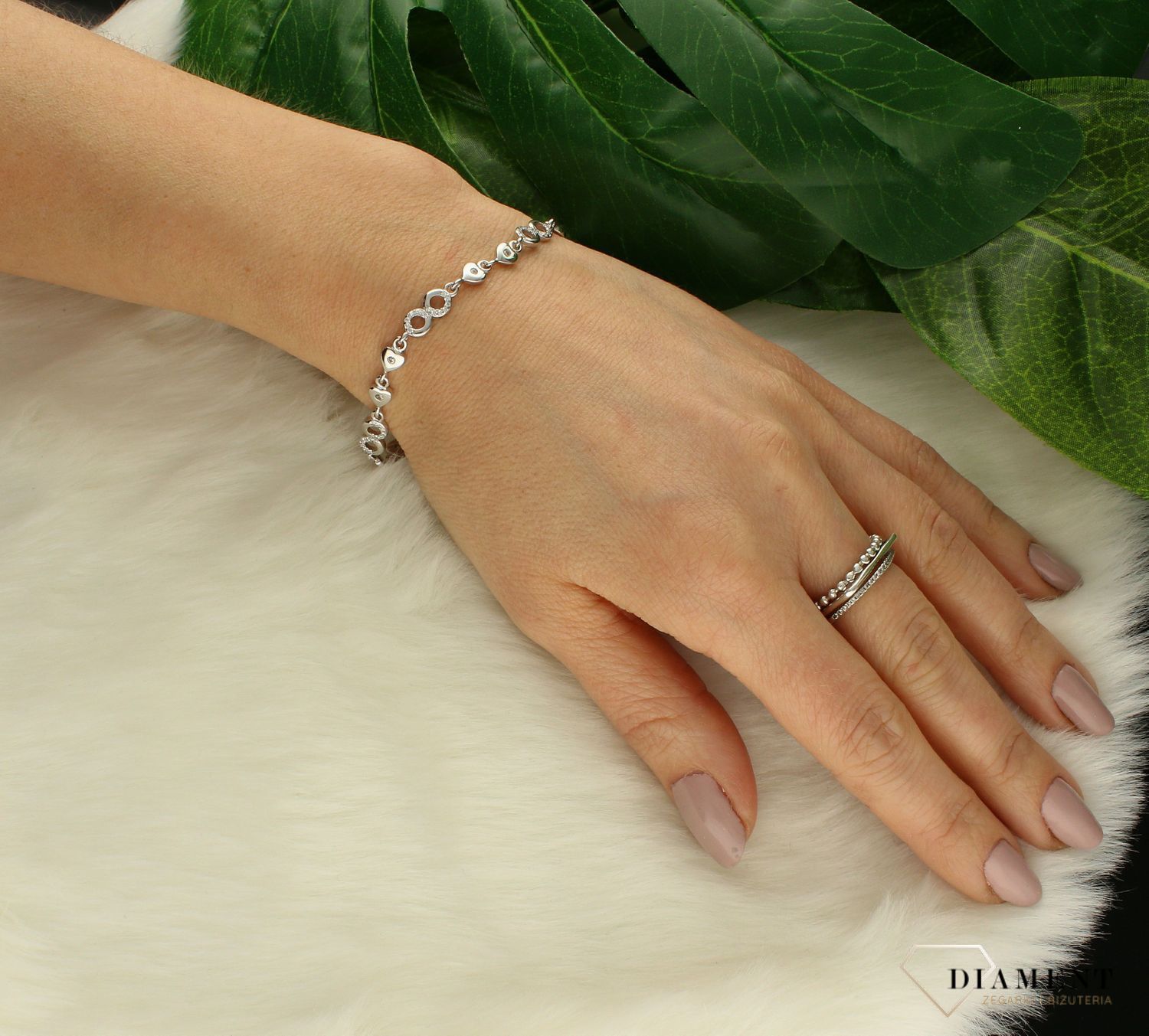 Srebrna bransoletka damska okrągłe elementy serca z cyrkoniami DIA-BRA-9669-925ds.jpg