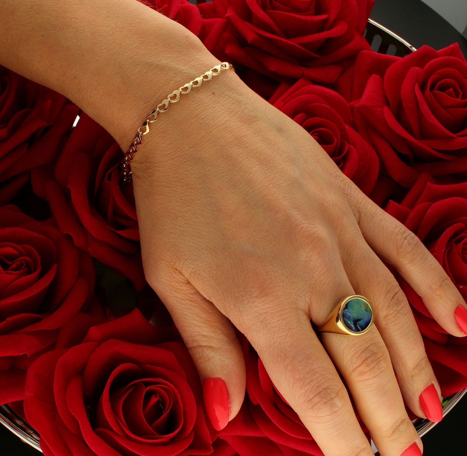 Damska bransoletka złota 585 o splocie połączonych serduszek DIA-BRA-9786-585.jpg