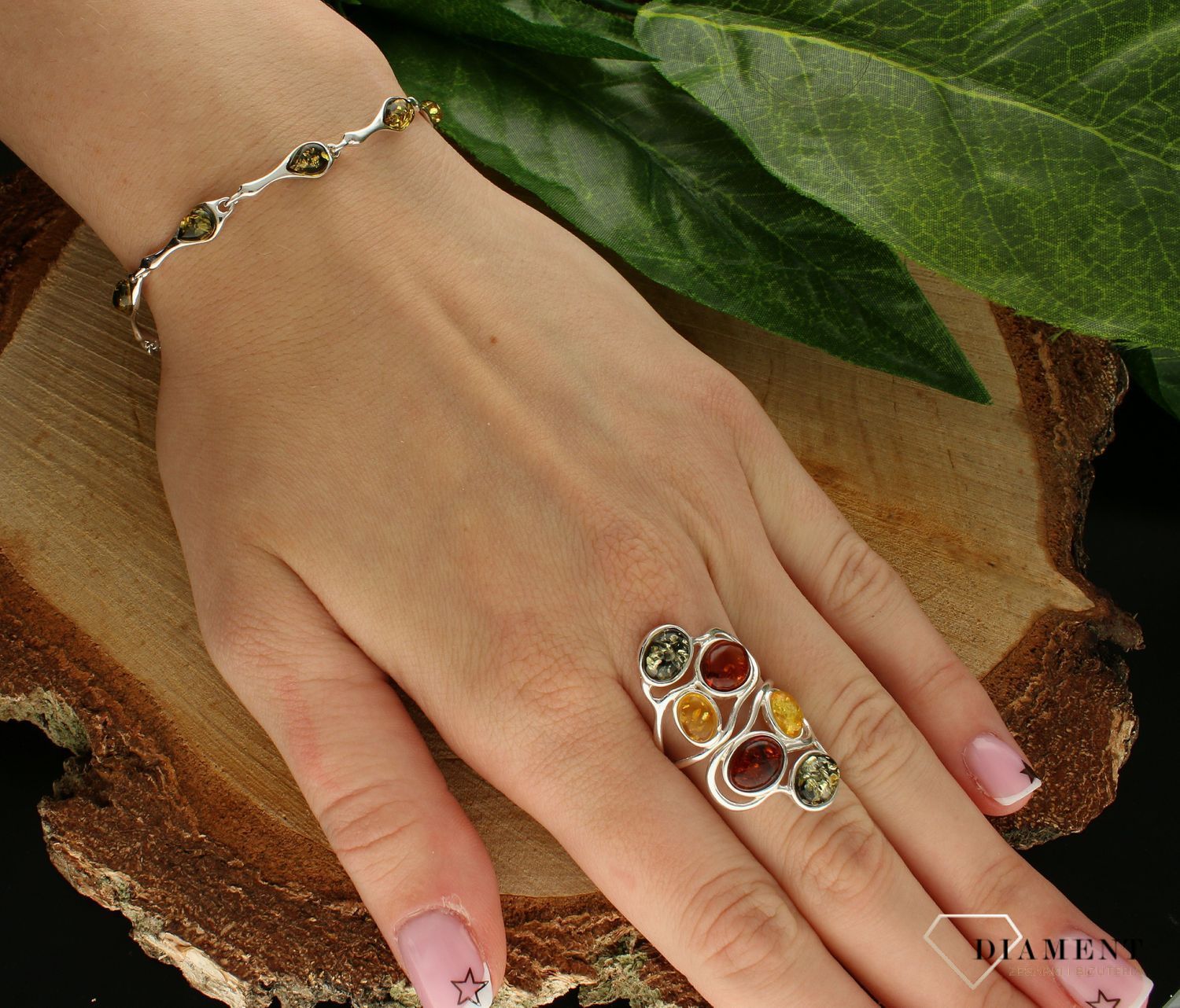 Srebrna bransoletka damska z zielonym bursztynem bałtyckim DIA-BRA-9964-925. Srebrna bransoletka damska idealna na prezent. Bran.jpg