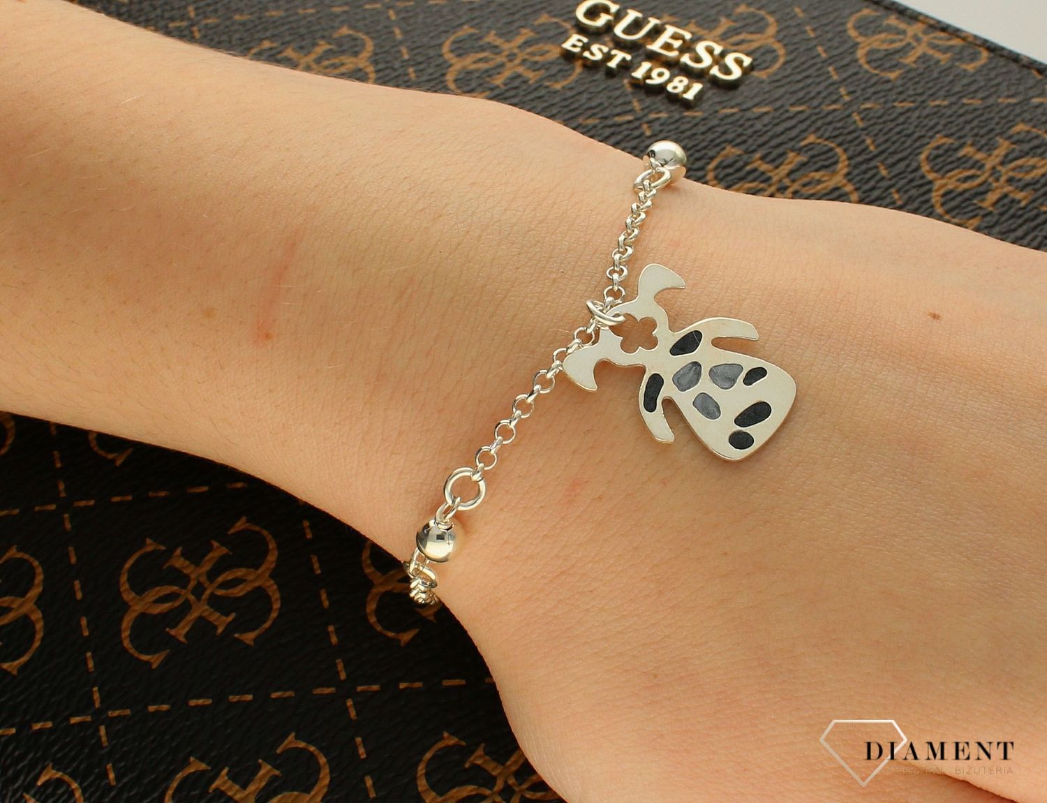 Srebrna bransoletka z zawieszką w kształcie dziewczynki DIA-BRA-APARTI37-925.jpg