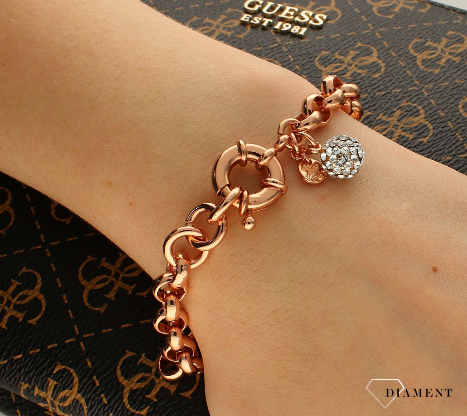 Bransoletka Karpiński 'Klasyczny róż' z kuleczką DIA-BRA-B11570AuR. Bransoletka Karpiński 'Klasyczny róż' z kuleczką. Wyjątkowa damska bransoletka, wykonana ze stali szlachetnej, która składa się z ogniw z różowego z.jpg