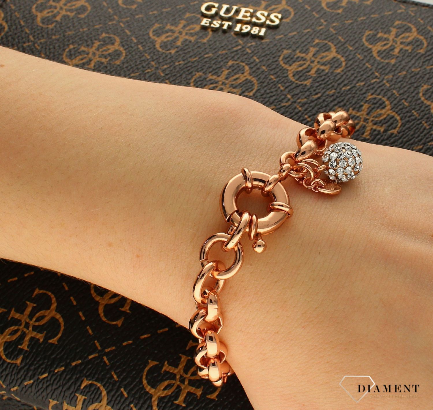 Bransoletka Karpiński 'Klasyczny róż' z kuleczką DIA-BRA-B11570AuR. Bransoletka Karpiński 'Klasyczny róż' z kuleczką. Wyjątkowa damska bransoletka, wykonana ze stali szlachetnej, która składa się z ogniw z różowego z.jpg