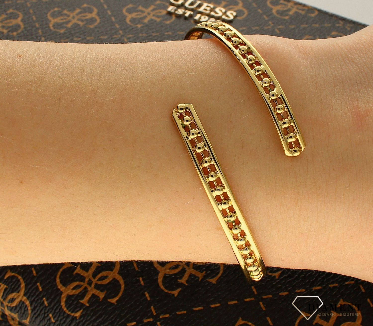 Bransoletka Karpiński sztywna w kolorze złota DIA-BRA-B14163Au.jpg