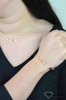 Złota bransoletka podwójny łańcuszek połączony sercami DIA-BRA-ENT40-585. Ponadczasowa, klasyczna biżuteria, w której harmonijne wzory wspaniasię z blaskiem żółtego złota ( (5).JPG