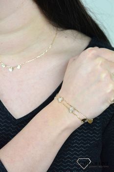 Złota bransoletka podwójny łańcuszek połączony sercami DIA-BRA-ENT40-585. Ponadczasowa, klasyczna biżuteria, w której harmonijne wzory wspaniasię z blaskiem żółtego złota (1).JPG
