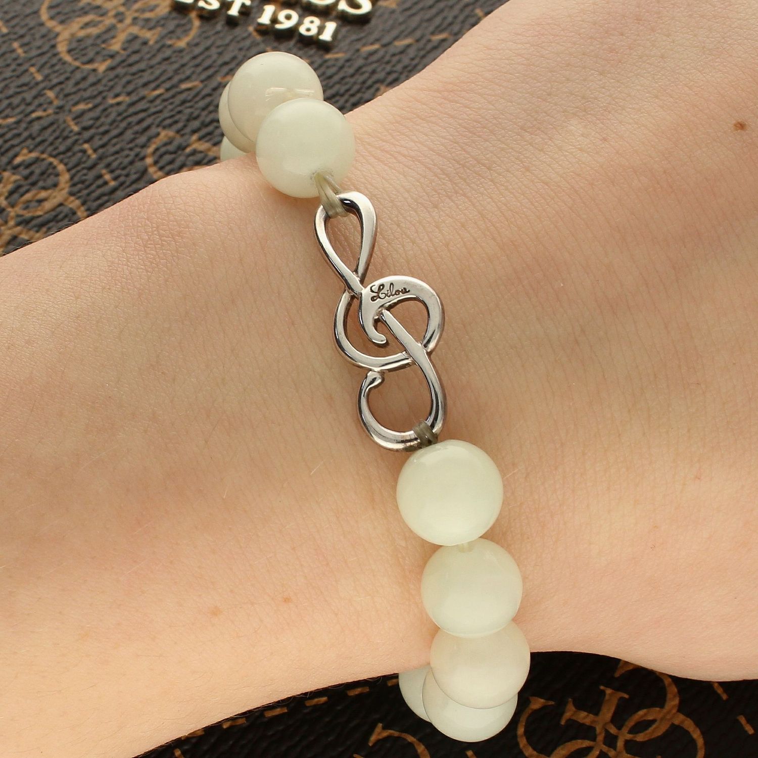 Bransoletka damska koraliki z kluczem wiolinowym DIA-BRA-KLUCZ-WIOLINOWY-925. Bransoletka damska z koralików. Bransoletka damska ze srebrną zawieszką. Bransoletka damska z kluczem wiolinowym (1).jpg