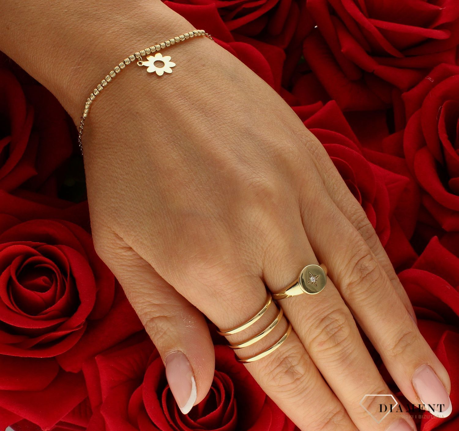 Złota bransoletka damska 585 grawerowane kuleczki z kwiatkiem DIA-BRA-KWIATEK-585. Złota bransoletka damska. Damska bransoletka złota próby 585. Bransoletka złota z kwiatkiem idealna na prezent dla kobiety.  (2).jpg