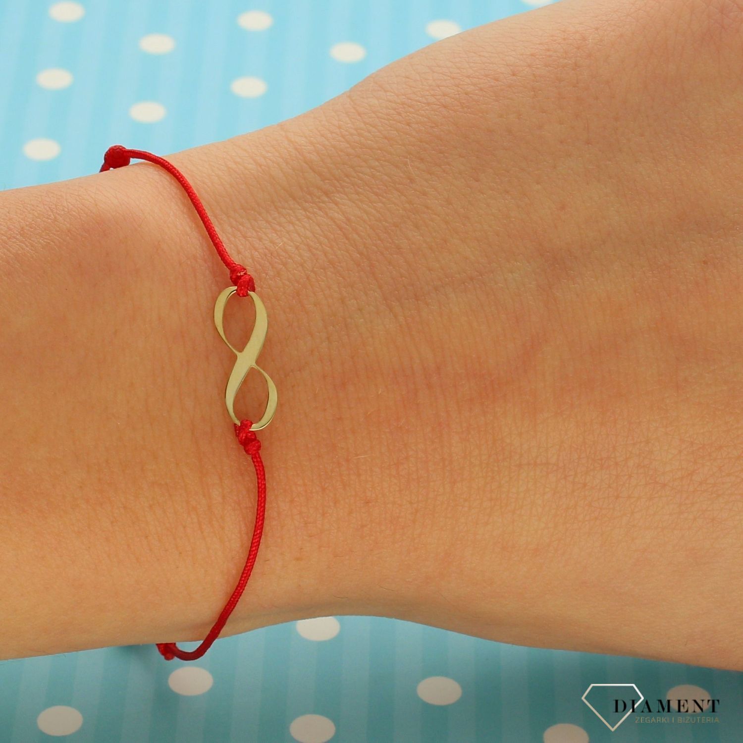 Złota bransoletka na czerwonym sznurku z nieskończonością 585 DIA-BRA-LU059G8K-585, bransoletka z czerwnym sznurkiem.jpg