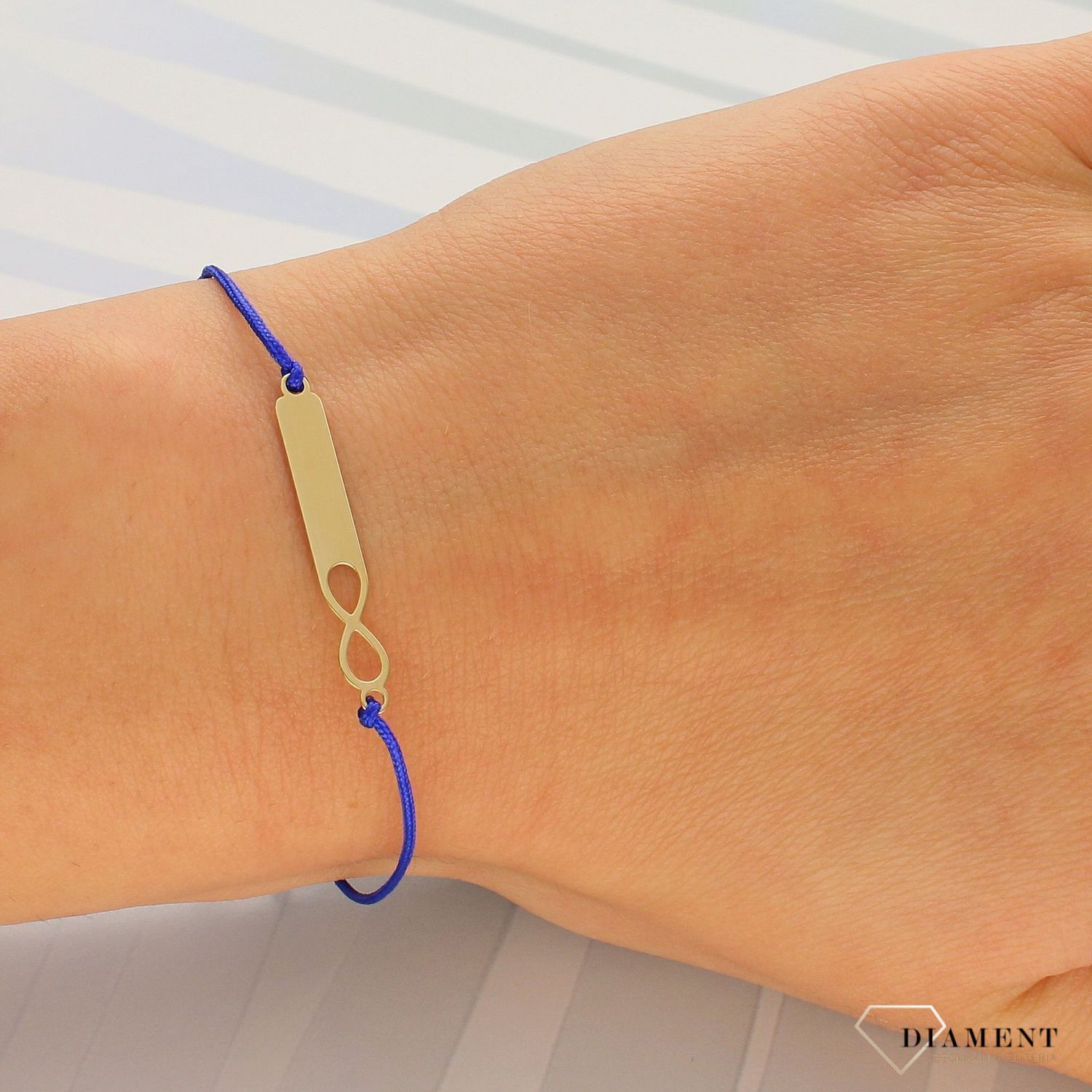 Bransoletka na granatowym sznurku z blaszką i znakiem nieskończoności (1).jpg
