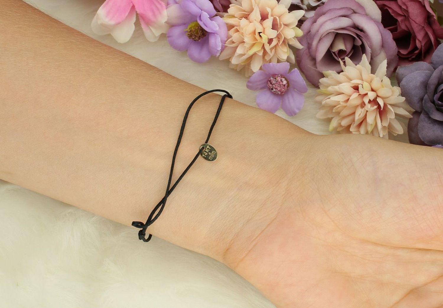 Bransoletka damska ze złota 585 na czarnym sznureczku z zawieszką w kształcie psiej łapki (1,1 cm). Model DIA-BRA-LU104G14KBLACK. Lekka, symboliczna i elegancka.1.jpg