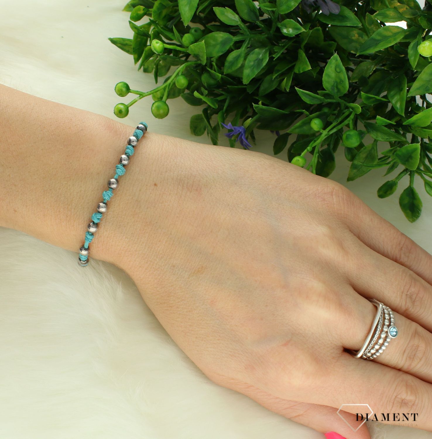 Srebrna bransoletka damska 925 na turkusowym sznureczku dziesiątka różańca z krzyżem DIA-BRA-NIEBIESKI-SZNUREK-925. Bransoletka typu różaniec będzie idealnym prezentem na komunię czy bierzmowanie.4.jpg