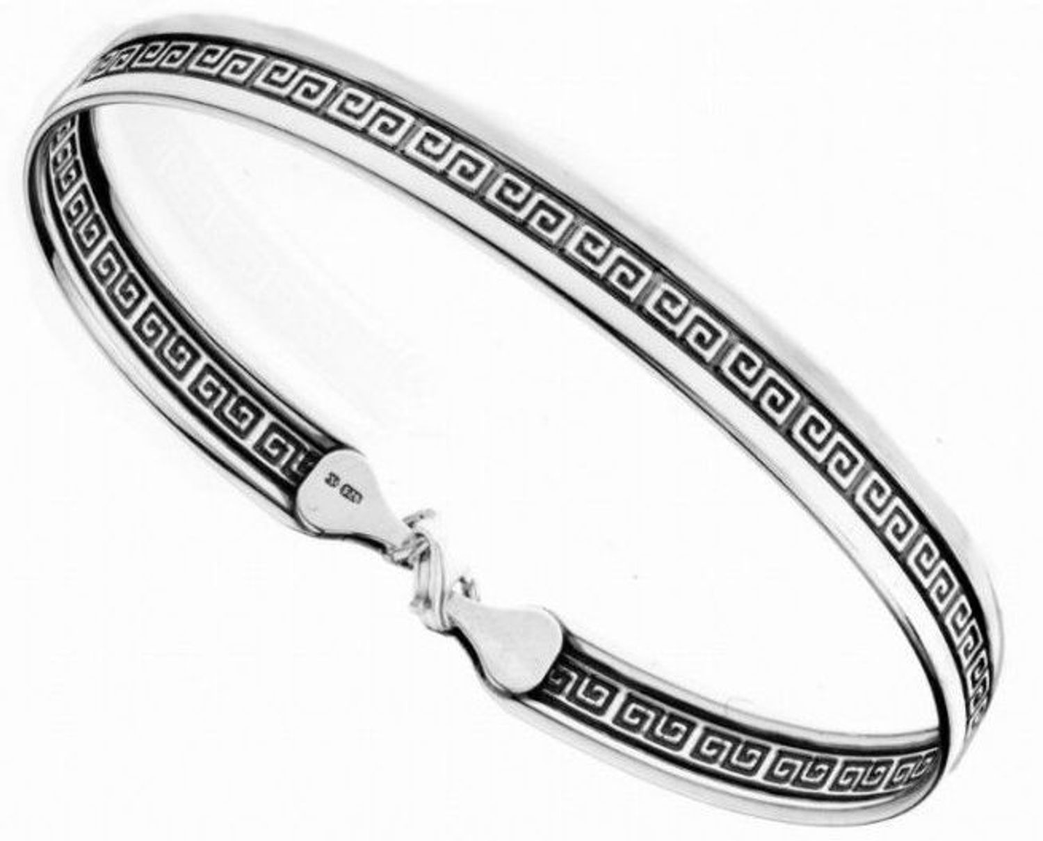 Stylowa srebrna bransoletka Ag 925 z klasycznym greckim wzorem meandry. Sztywna forma, oksydowane wykończenie. Bez kamieni. Średnica 65 mm, waga 6,7 g.2.jpg