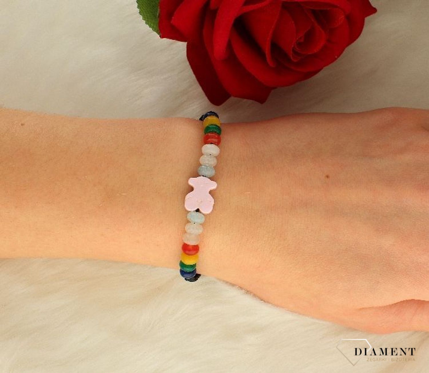 Bransoletka dziecięca kolorowe koraliki z misiem Tuos na sznurku DIA-BRA-TUOS2-925. Modna bransoletka na czarnym sznureczku z kolorowymi koralikami oraz misiem Tuos w różowym kolorze. Idealna bransoletka dziecięca na sznurku.jpg