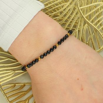 Bransoletka damska z turmalinem i hematytem – złote akcenty, regulowana black.jpg