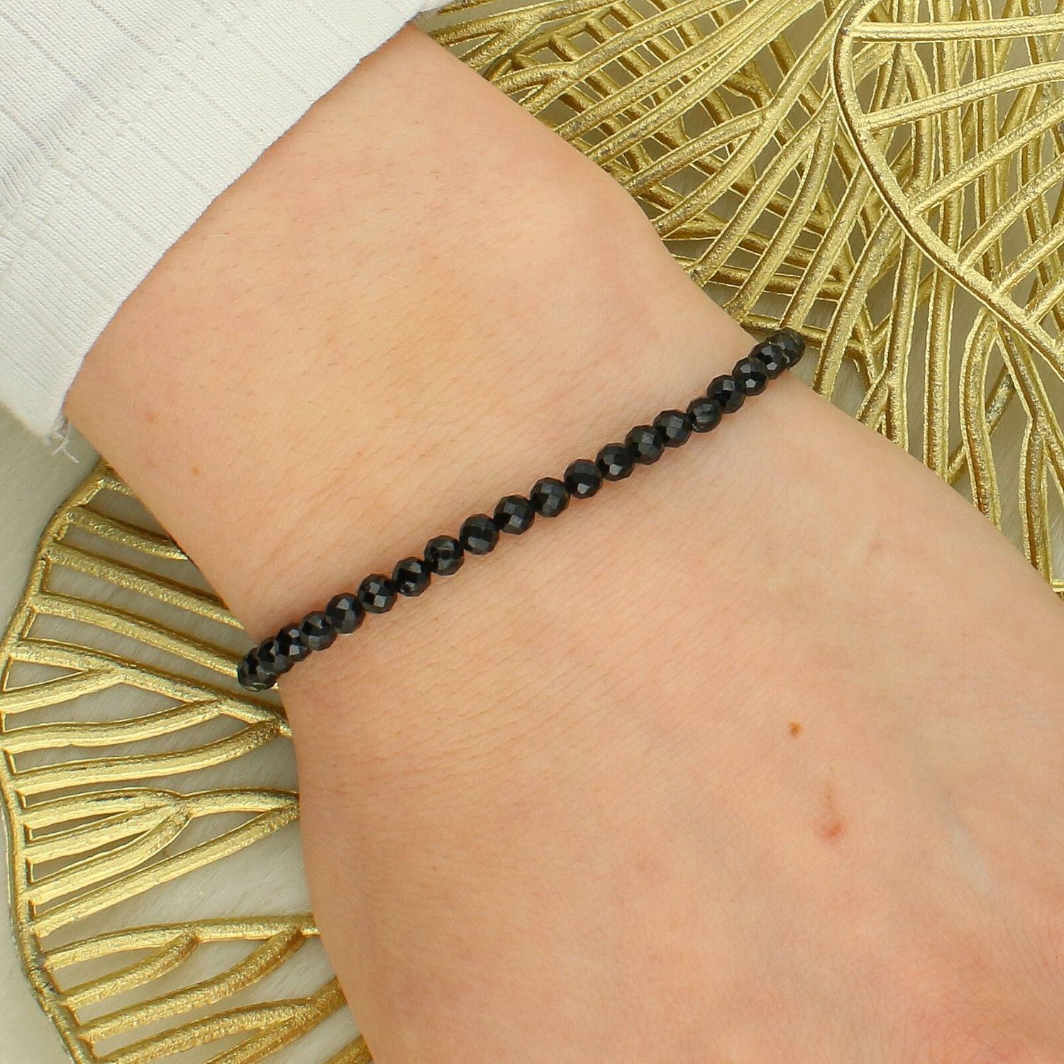 Bransoletka damska z turmalinem i hematytem – regulowana, czarny sznurek.jpg