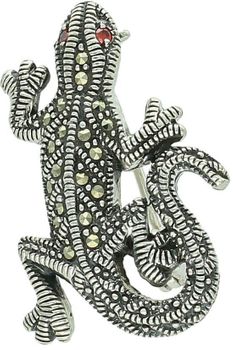 Srebrna broszka damska próba 925 w kształcie jaszczurki, zdobiona markazytami i oczami z czerwonej cyrkonii. Wymiary 3,0 cm x 1,7 cm, waga 5,22 g. Oryginalna biżuteria na prezent.1.jpg