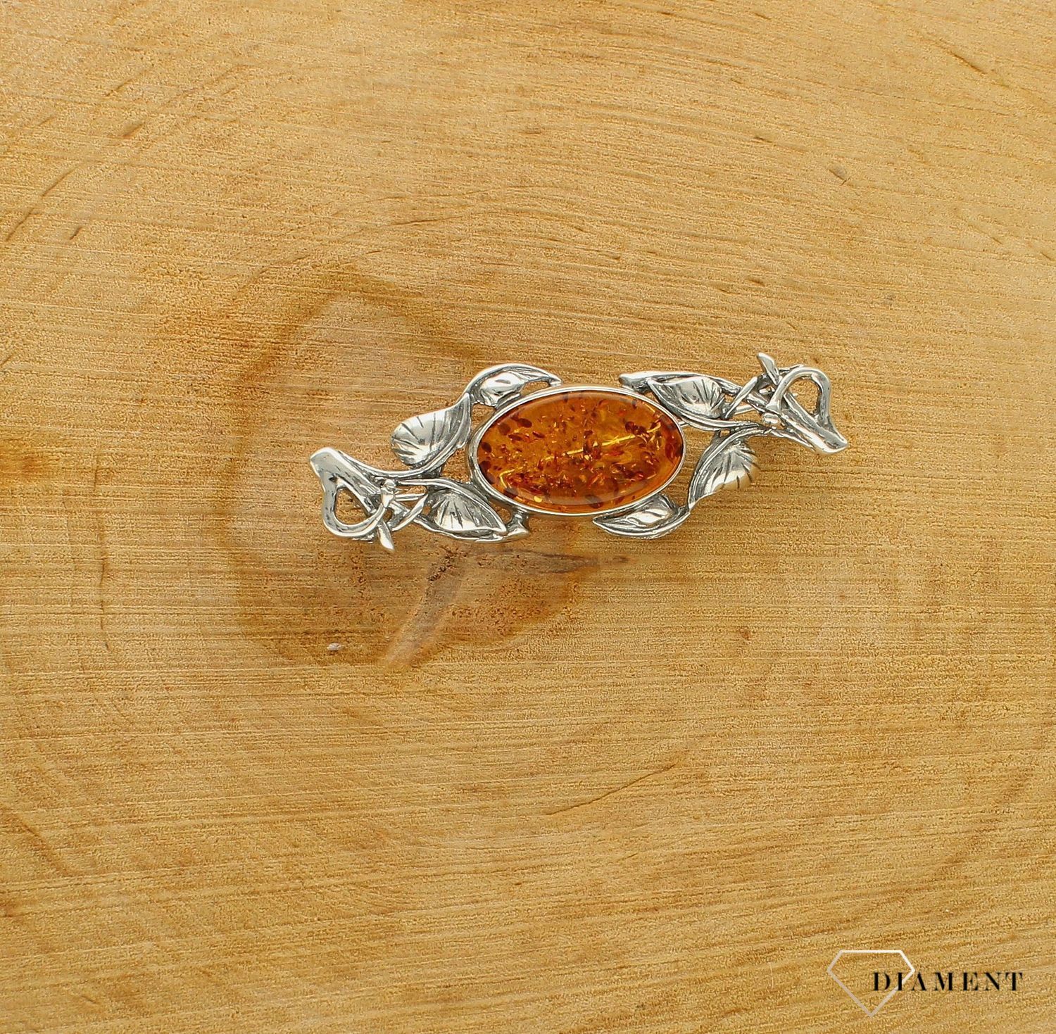 Srebrna broszka o podłużnym kształcie z owalnym bursztynem DIA-BRO-9925-925df.jpg