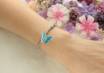 Zawieszka charms Motyl z niebieską emalią i cyrkoniami. Wykonana ze srebra rodowanego Ag 925. Symbol lekkości i przemiany – idealna na prezent!3.jpg