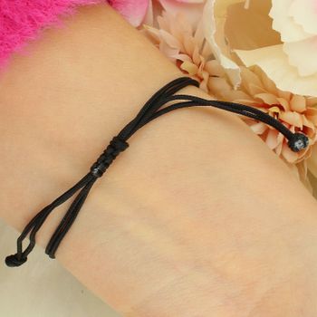 Delikatna bransoletka srebrna 925 pozłacana z kokardką na czarnym sznurku. Regulowane zapięcie ściągane, lekka i elegancka, waga 2 g.4.jpg