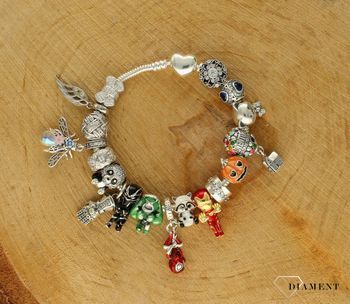 Charms Moments srebrny 925 kokardka wysadzona cyrkoniami DIA-CHA-9512-925. Zawieszka wykonana została ze srebra próby 925. To idealny charms na prezent. Charms do bransoletki typu Pandora.  (2).jpg