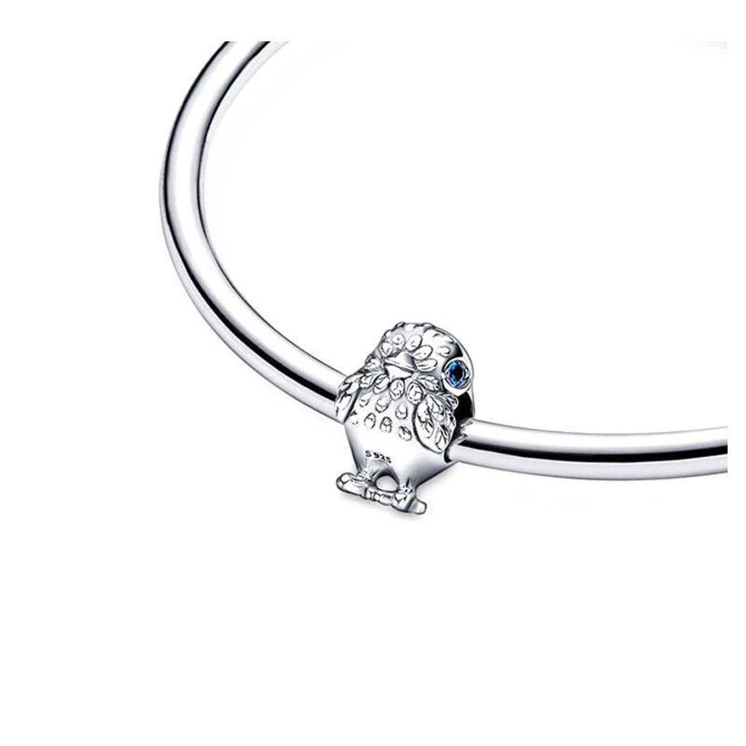 Delikatny charms srebrny AG 925 w kształcie ptaka z niebieską cyrkonią. Elegancka i lekka zawieszka do bransoletki lub naszyjnika, ok. 11,5 mm długości.1.jpg