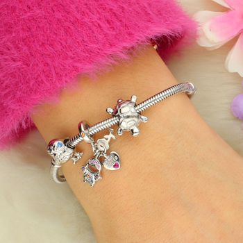 Delikatny charms srebrny AG 925 w kształcie ptaka z niebieską cyrkonią. Elegancka i lekka zawieszka do bransoletki lub naszyjnika, ok. 11,5 mm długości.9.jpg