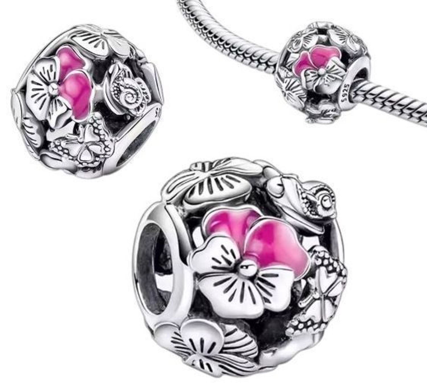 Srebrna zawieszka charms z motywem kwiatów i motyli pokryta różową emalią. Wykonana z rodowanego srebra próby Ag 925. Subtelny, kobiecy dodatek do bransoletki.3.jpg