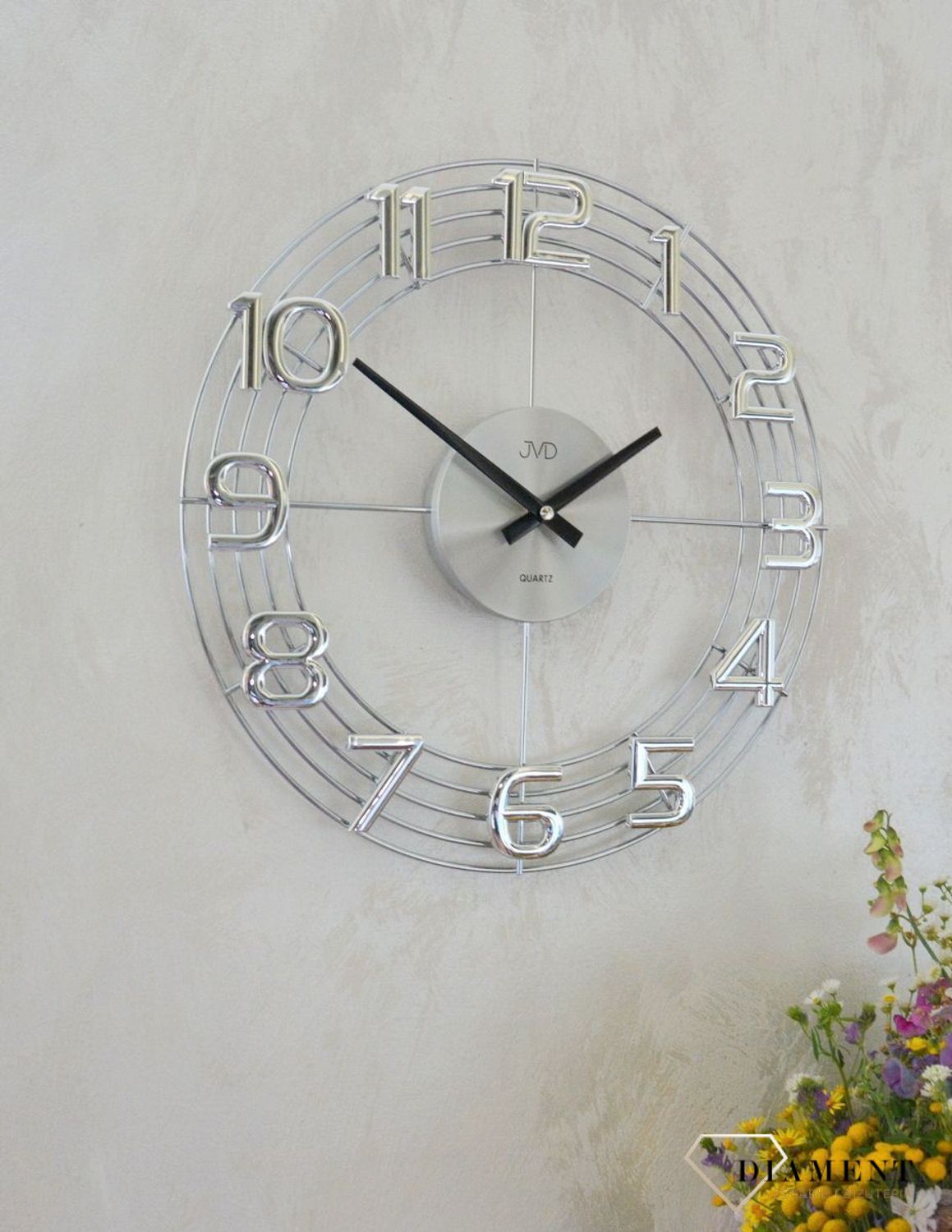 Zegar ścienny 3D JVD HT112.1 wyposażony jest w kwarcowy mechanizm, zasilany za pomocą baterii. Posiada bardzo wysoką dokładność mierzenia czasu +- 10 sekund w przeciągu 30 dni..jpg