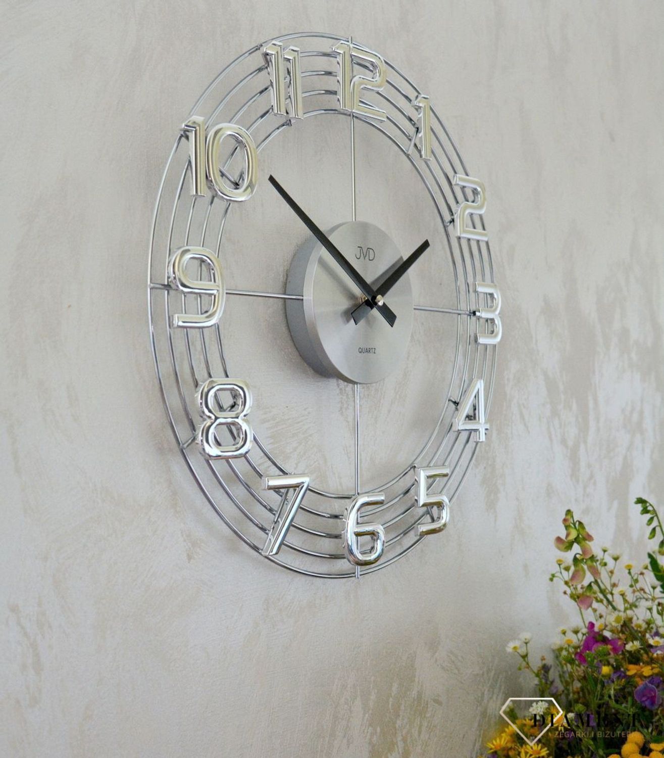 Zegar ścienny 3D JVD HT112.1 wyposażony jest w kwarcowy mechanizm, zasilany za pomocą baterii. Posiada bardzo wysoką dokładność mierzenia czasu +- 10 sekund w przeciągu 30 dni..jpg