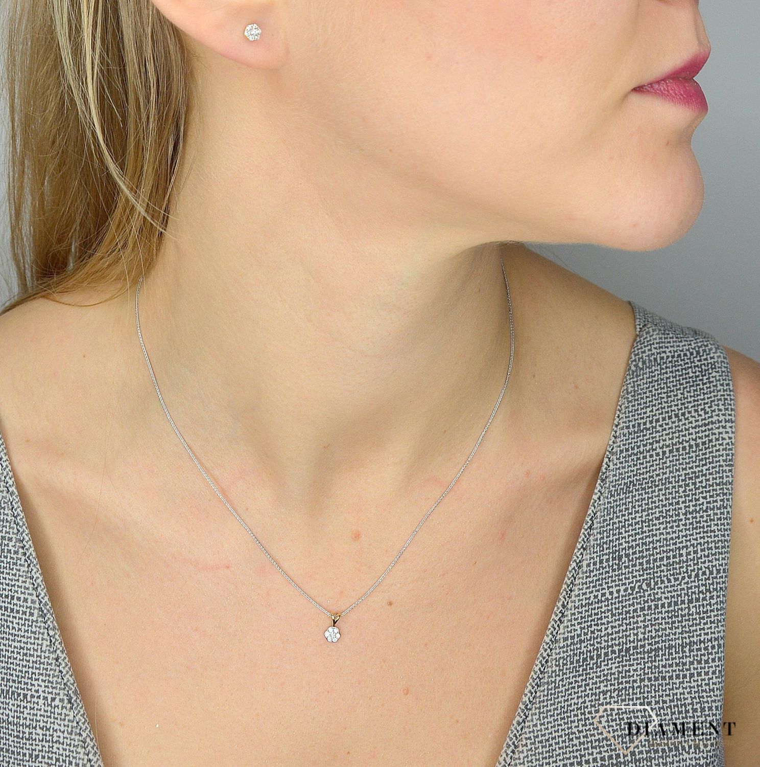 Złote kolczyki 585 cyrkonie kwiatki przy uchu DIA-KLC-0986K-585.jpg