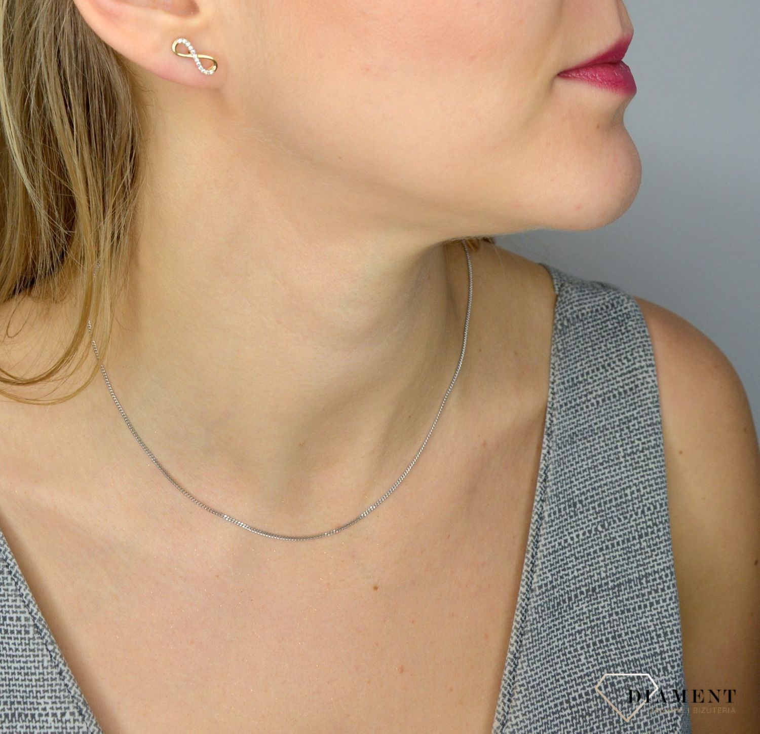 Złote kolczyki 585 znak nieskończoności z cyrkonią DIA-KLC-1010-585.jpg