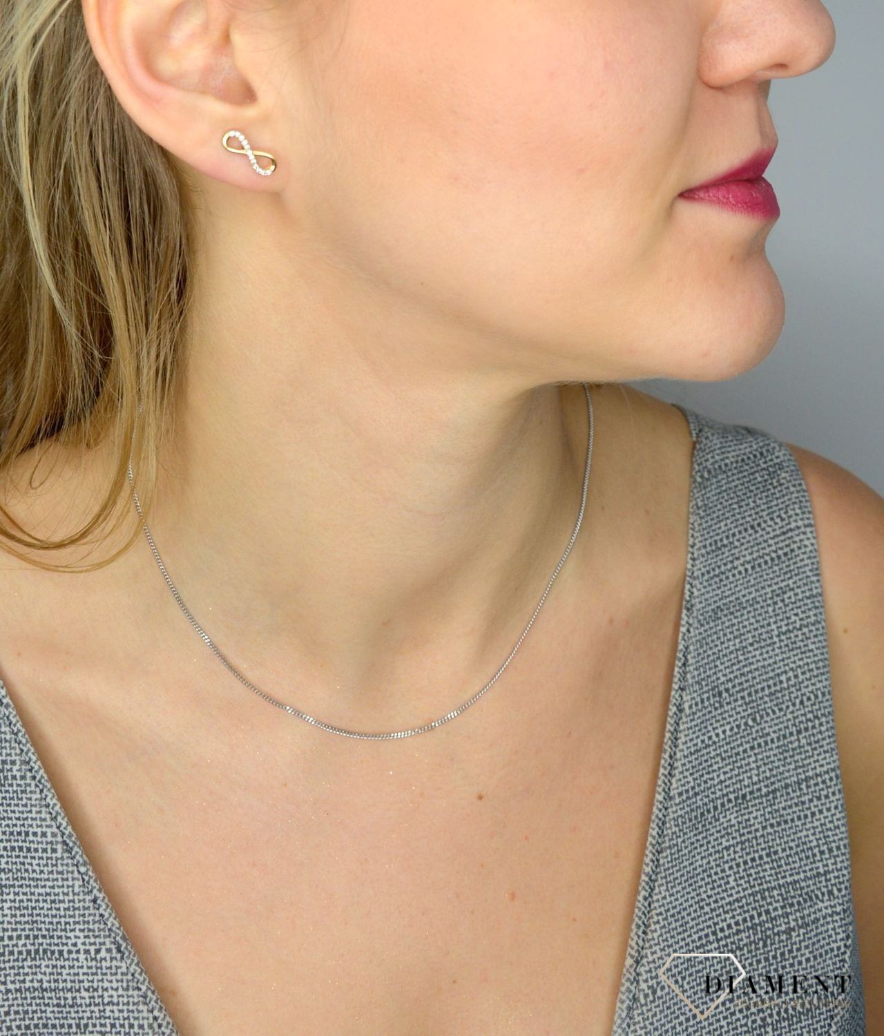 Złote kolczyki 585 znak nieskończoności z cyrkonią DIA-KLC-1010-585.jpg