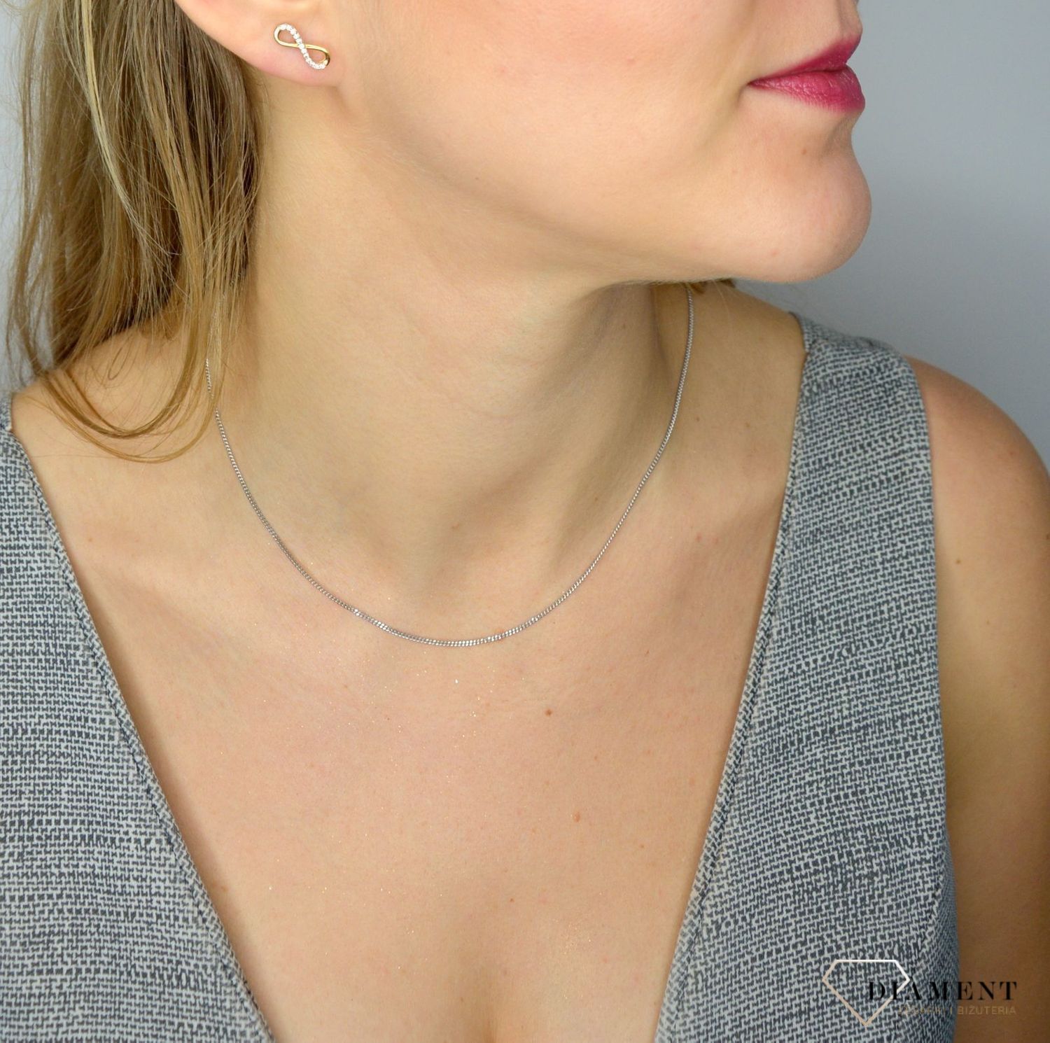 Złote kolczyki 585 znak nieskończoności z cyrkonią DIA-KLC-1010-585.jpg