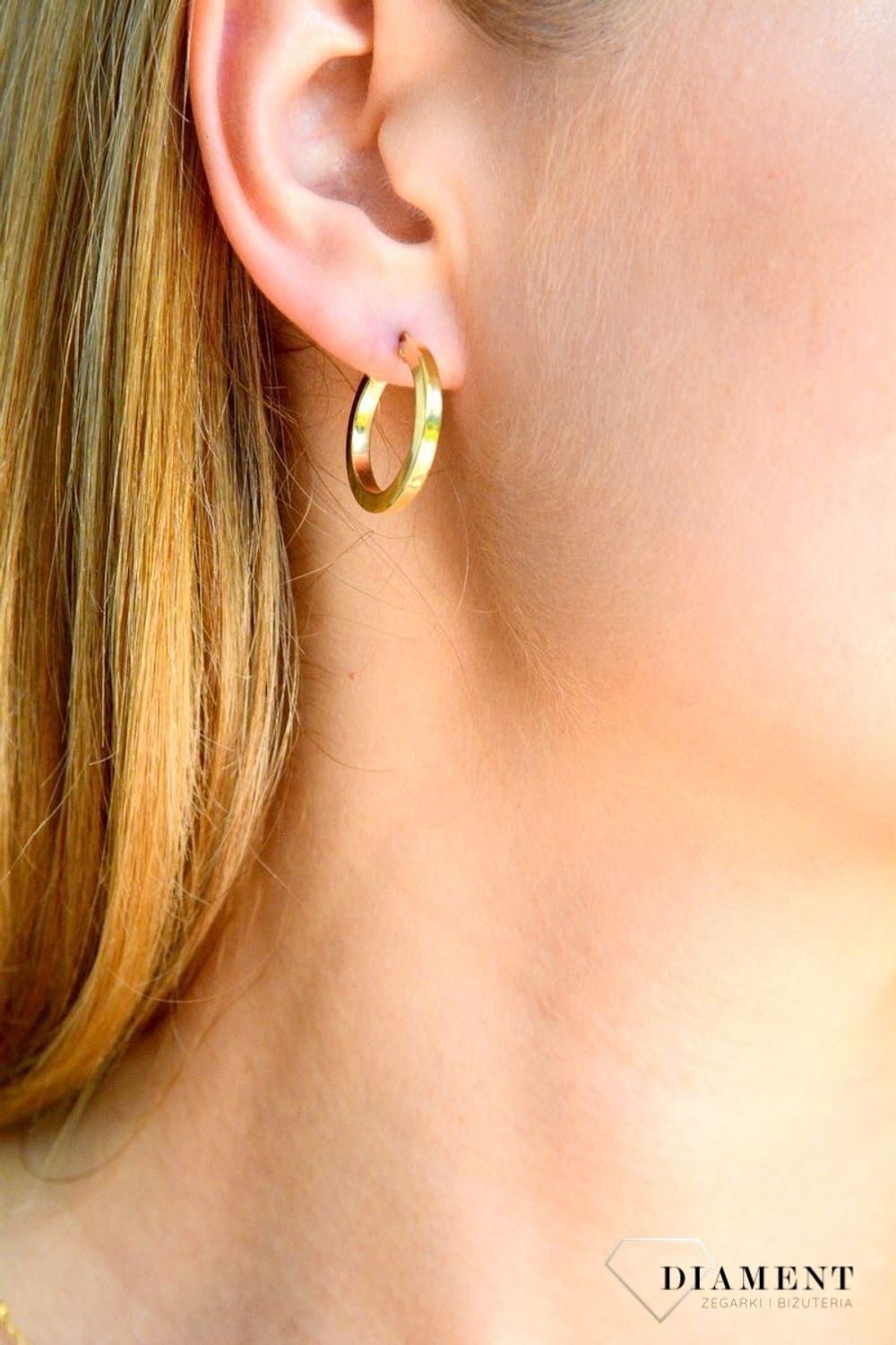 Kolczyki damskie złote Ścięte koła 585 DIA-KLC-10375-585  Złote kolczyki wykonane z najwyższej jakości żółtego złota, próby 585. Kolczyki o formie koła. Kolczyki złote wiszące idealne na prezent..jpg