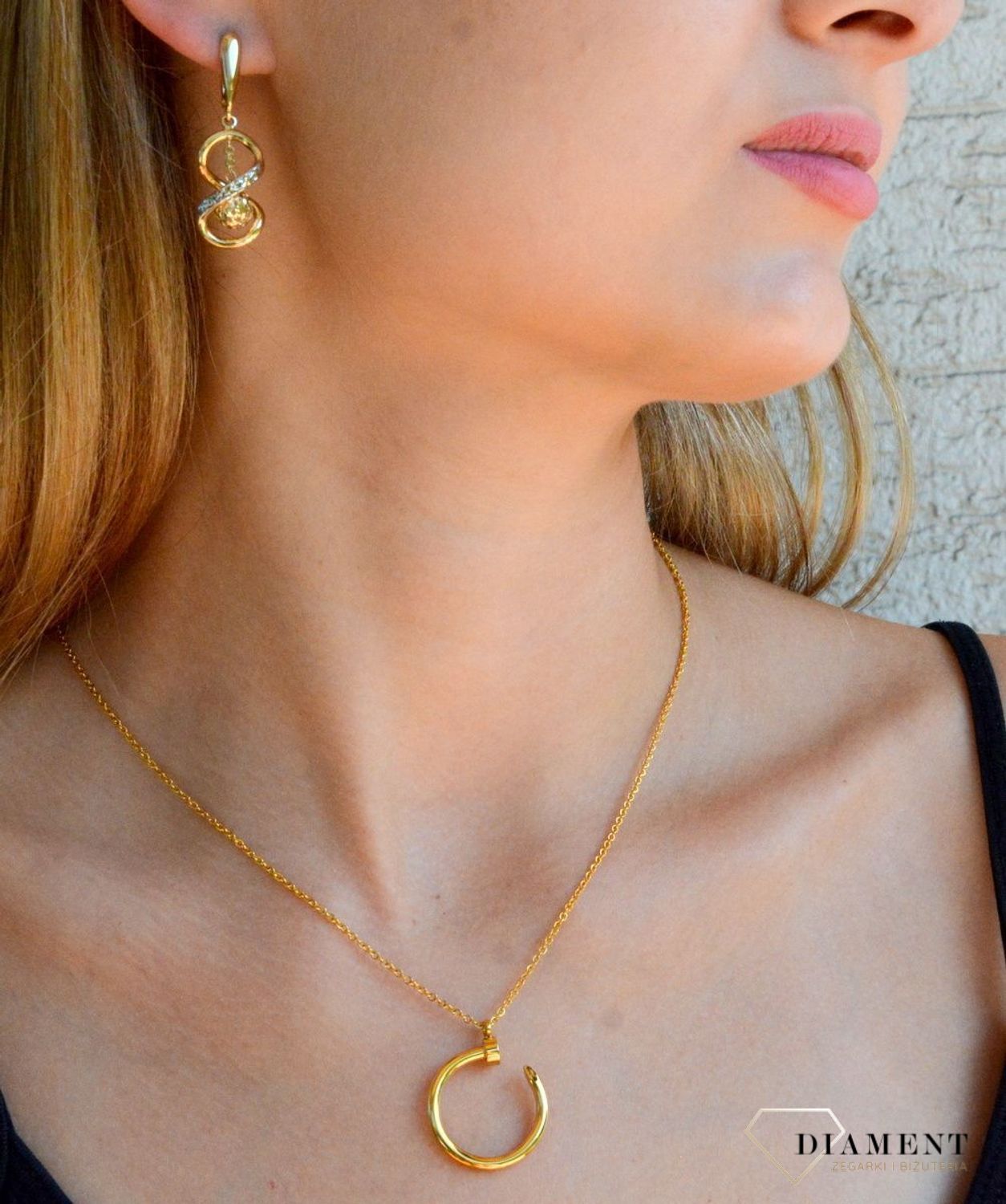 Kolczyki damskie złote Zakręcona ósemka z kuleczką 585 DIA-KLC-10379-585.jpg