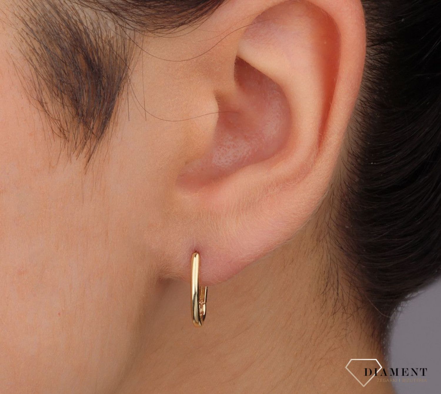 Złote kolczyki damskie 375 złote kolczyki owalne koła DIA-KLC-11193-375 Złote kolczyki damski o ponadczasowej formie kółek. Wąskie kolczyki koła idealne na prezent dla  każdej kobiety. Złote damskie kolczyki.webp